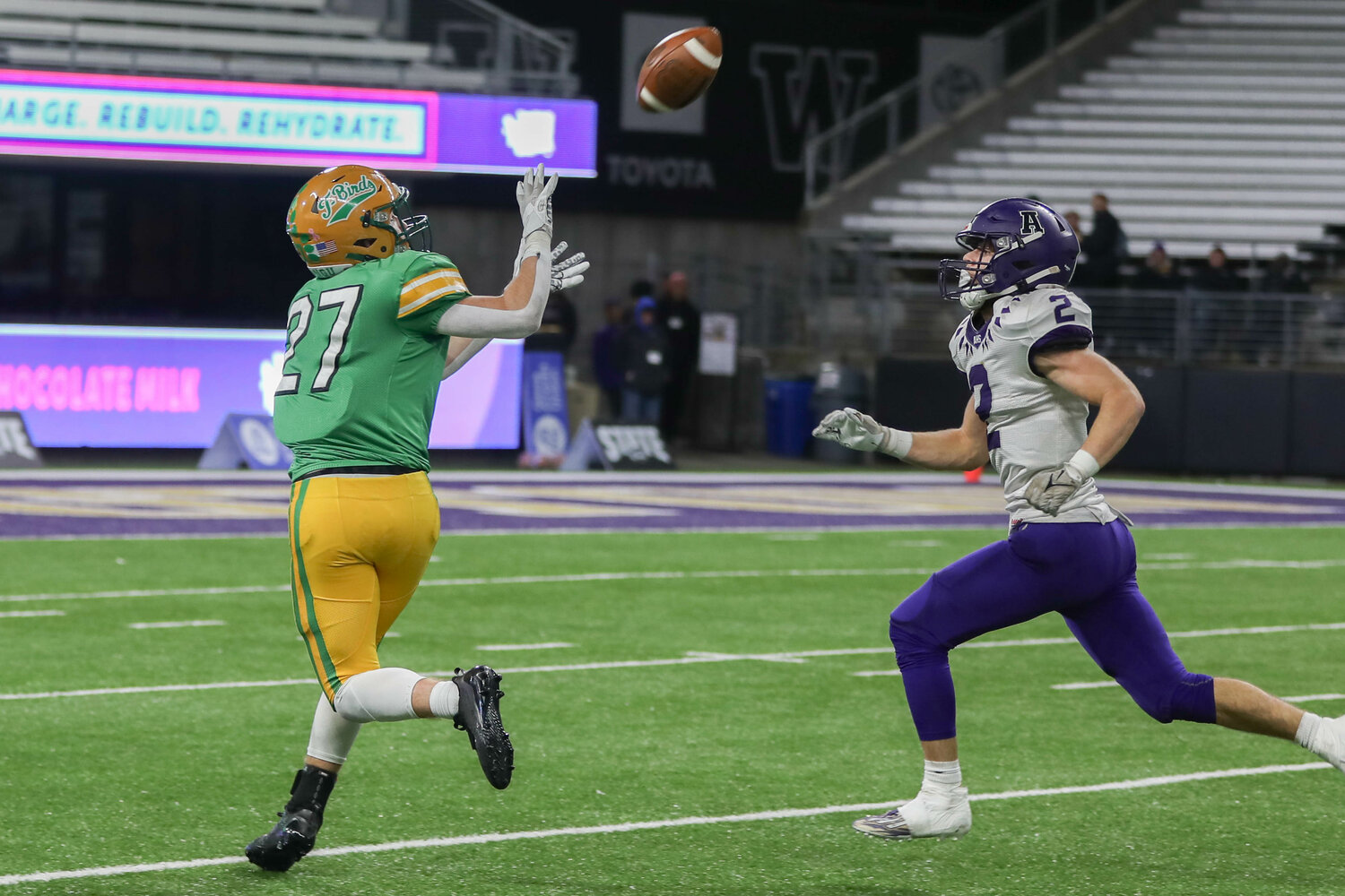 Tumwater's Derek Thompson secures a catch  during a 60-30 loss to Anacortes Dec. 2. at Husky Stadium.
